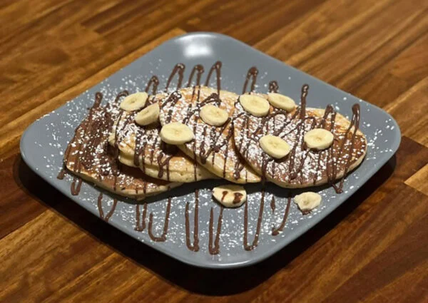  What Makes Bare Pantry Cafe’s Nutella Pancakes a Decadent Breakfast Choice?